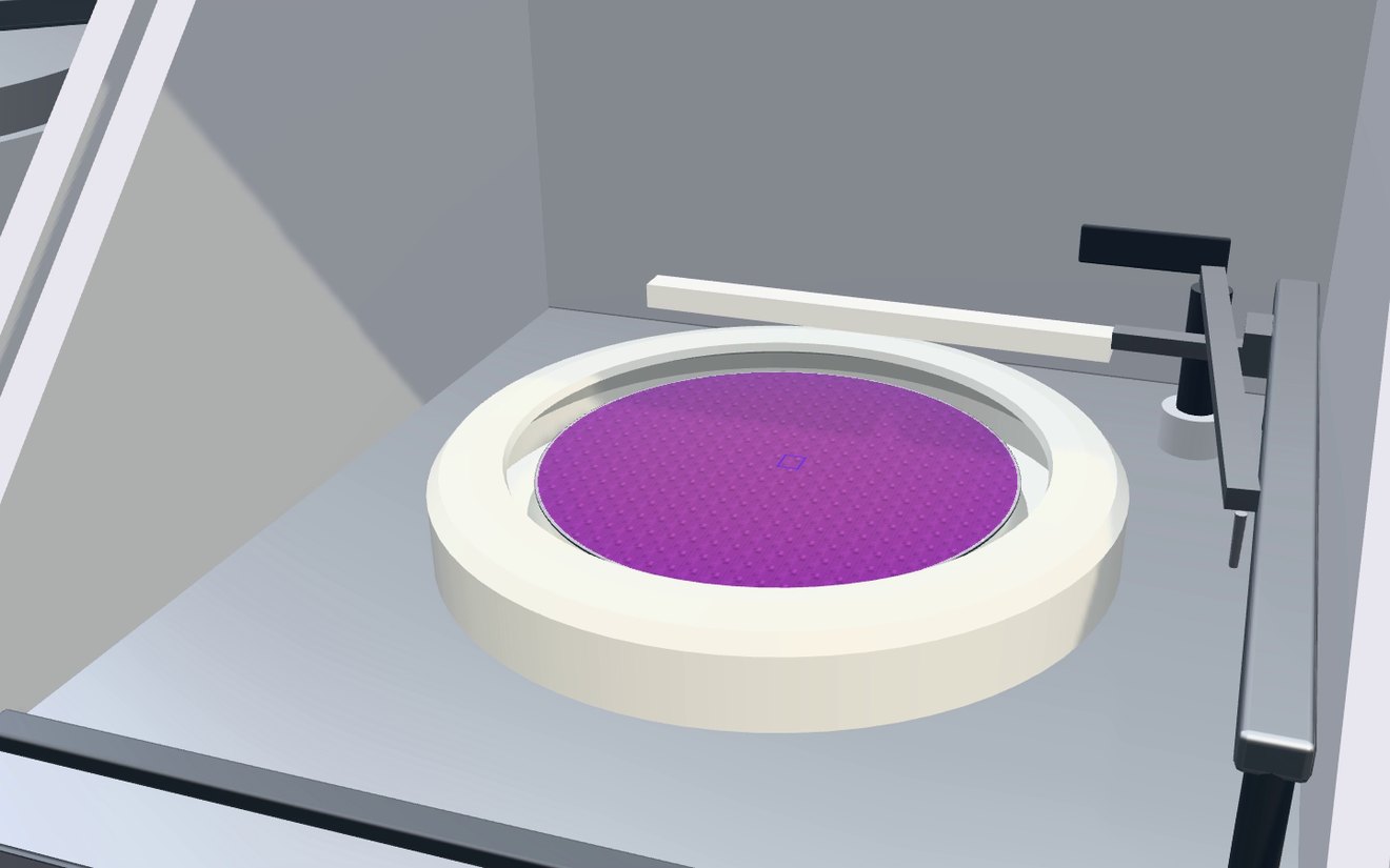 Fab One, rendered in the simulation: a resist-coated wafer in the developer bowl, the dispense arm above it.