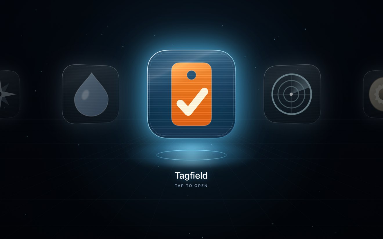 Holograph on iPad: a launcher tile glowing behind cyan glass on a dark stage, with more tiles on either side.